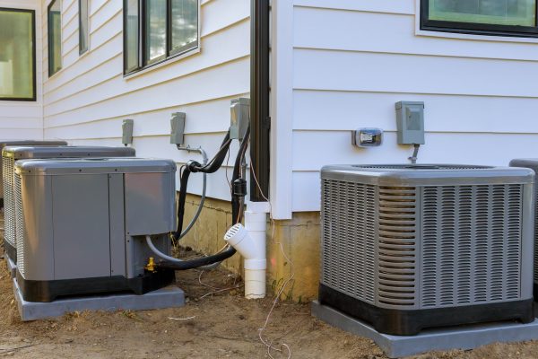 Several outdoor residential air conditioning units